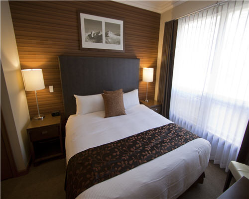 Bedroom in Nelsen Lodge at Revelstoke Mountain Resorty