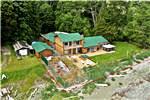 BOWSER PROPERTY FOR SALE ON VANCOUVER ISLAND - 4-Bedroom Waterfront Home for Sale on 0.73 Acres